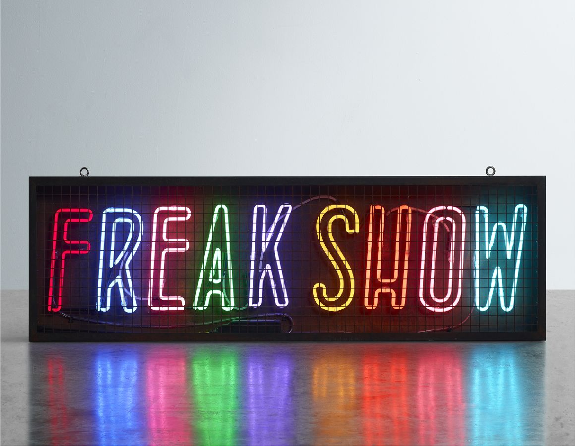 Neon Freakshow Hire - Kemp London - Bespoke neon signs and prop hire.